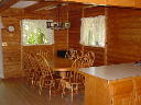 View of dining room from kitchen showing snack bar.
