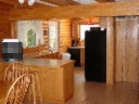 View of kitchen from dining room showing snack bar.