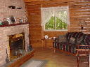 Living room with natural fireplace.